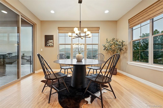 15377 W Iliff Dr, Denver, CO 80228 - dining space with a chandelier, light wood-style flooring, baseboards, and recessed lighting