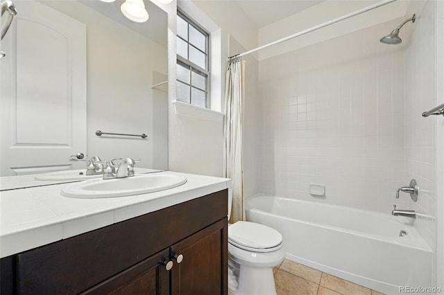 15377 W Iliff Dr, Denver, CO 80228 - full bathroom with vanity, shower / bath combo, toilet, and tile patterned floors