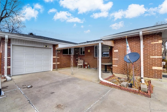 single story home featuring a garage