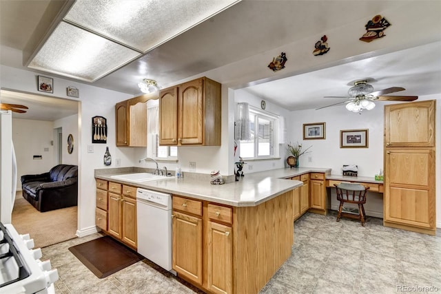 kitchen featuring sink, white appliances, kitchen peninsula, and ceiling fan