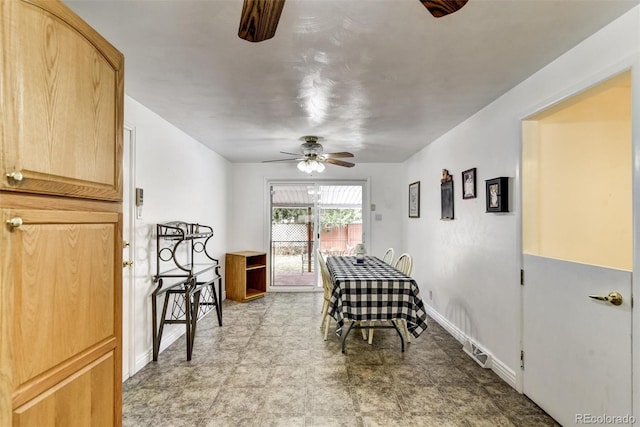 dining room with ceiling fan