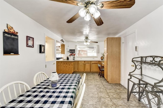 dining room with ceiling fan