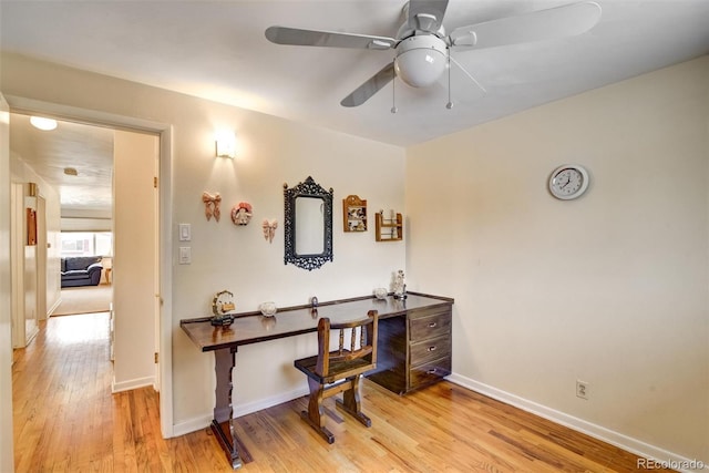 office area with ceiling fan and light wood-type flooring