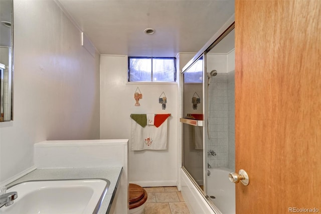 full bathroom featuring vanity, enclosed tub / shower combo, and toilet