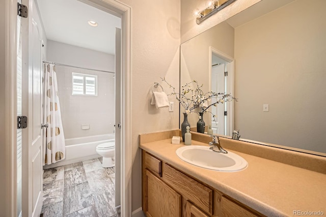 bathroom featuring vanity, toilet, and shower / tub combo with curtain