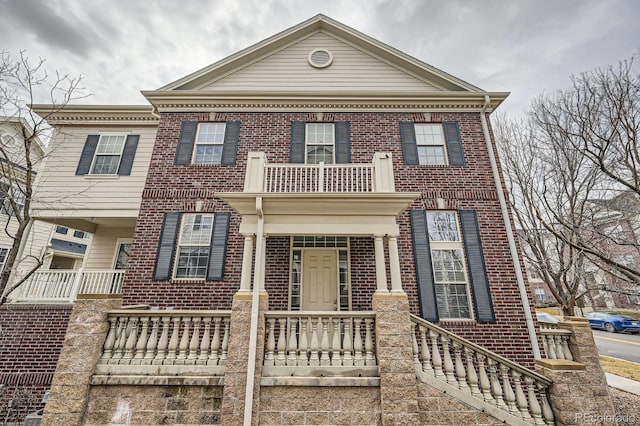 view of front of home with brick siding