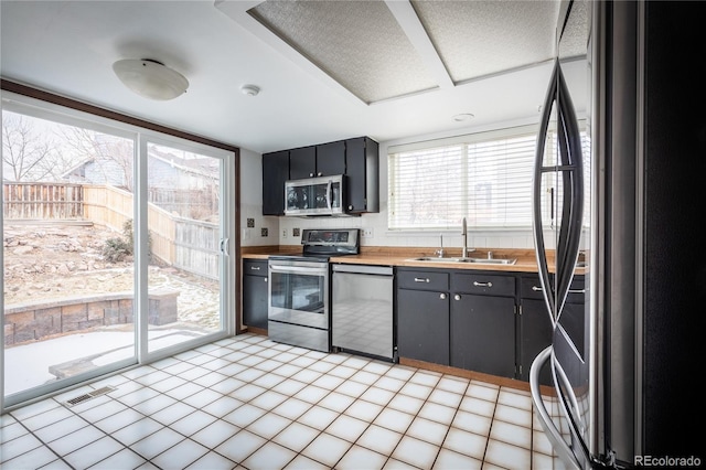 kitchen with sink and stainless steel appliances