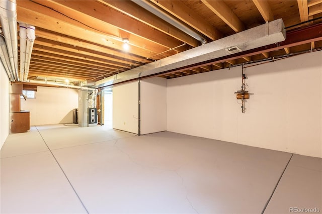 basement featuring heating unit