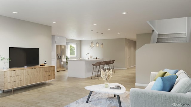 living room with light wood-style floors, recessed lighting, stairs, baseboards, and a chandelier