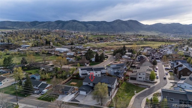 1353 Quaker St, Golden, CO 80401 - aerial view of property's location featuring mountains and nearby suburban area