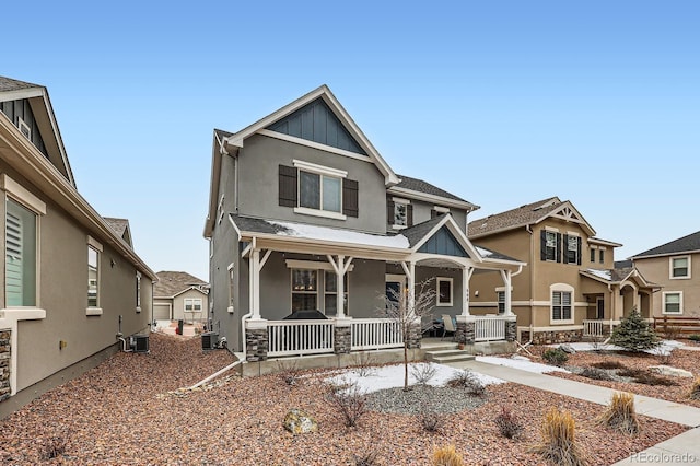 668 Sage Forest Ln, Monument, CO 80132 - craftsman house with stucco siding, covered porch, board and batten siding, and central AC unit