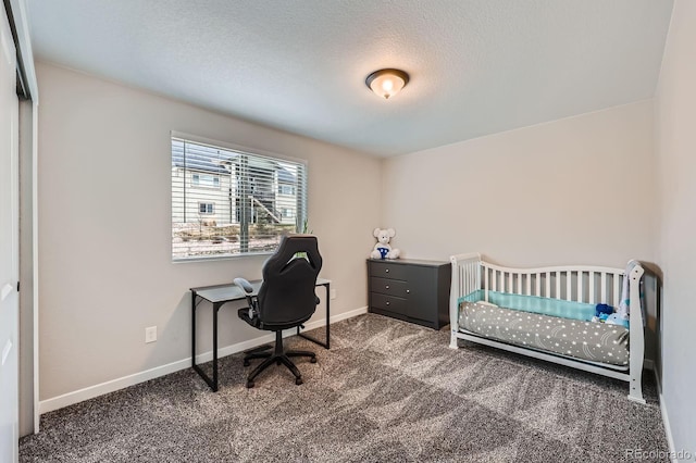 668 Sage Forest Ln, Monument, CO 80132 - carpeted office space featuring baseboards and a textured ceiling