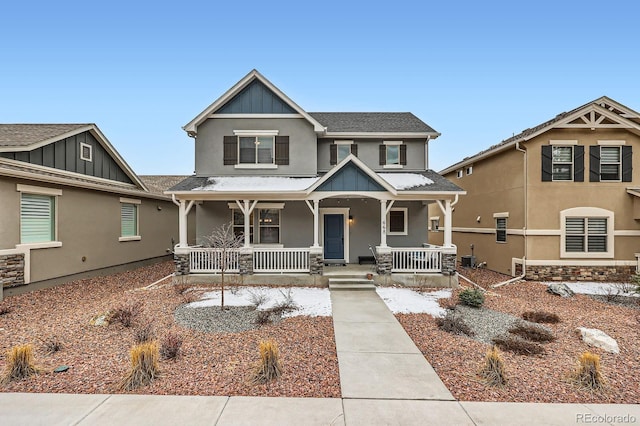 668 Sage Forest Ln, Monument, CO 80132 - craftsman-style home featuring board and batten siding, stucco siding, a porch, a shingled roof, and central air condition unit