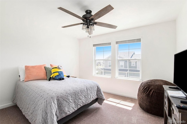 bedroom featuring carpet and ceiling fan