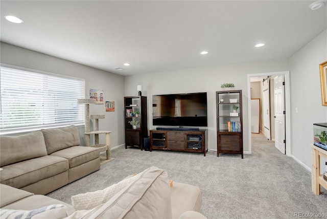 living room with carpet flooring, recessed lighting, and baseboards