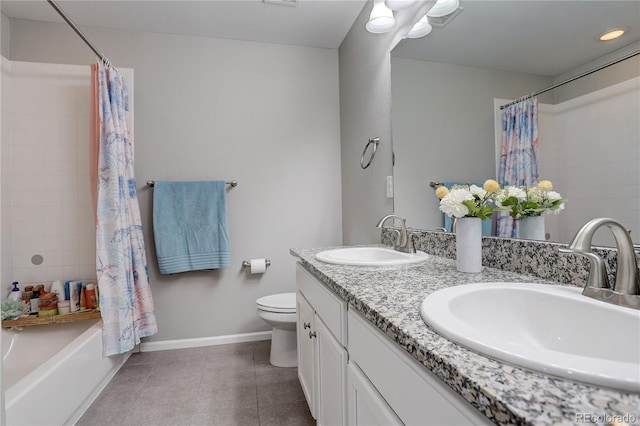 bathroom with toilet, shower / tub combo, tile patterned floors, double vanity, and baseboards