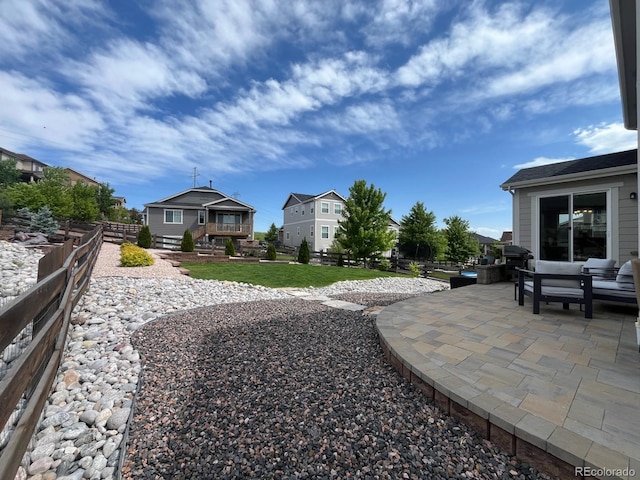 6630 S Coolidge Ct, Aurora, CO 80016 - view of yard with a patio, a residential view, and an outdoor hangout area