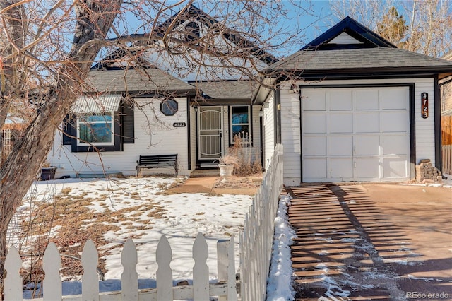 view of front of home with a garage