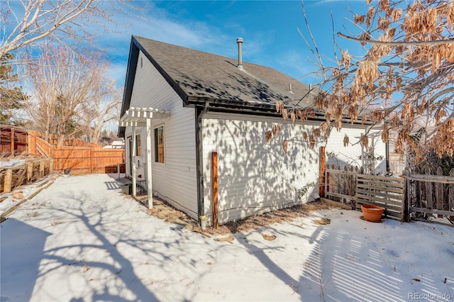 view of snow covered property