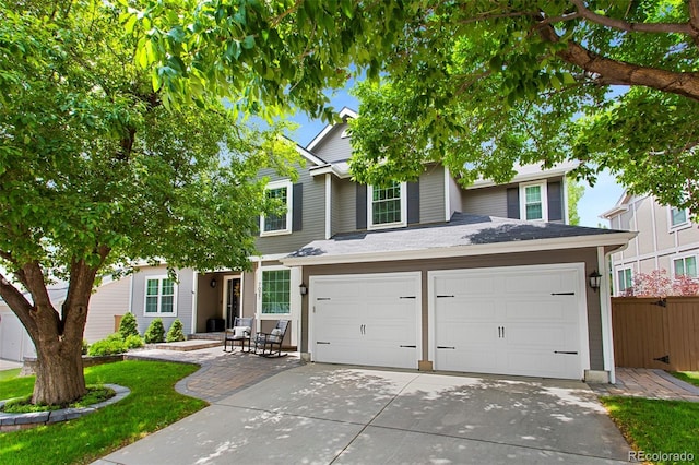 7027 Chestnut Hill St, Highlands Ranch, CO 80130 - view of front facade with concrete driveway and an attached garage