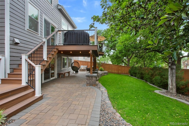 7027 Chestnut Hill St, Highlands Ranch, CO 80130 - fenced backyard with stairway, a patio area, and a deck