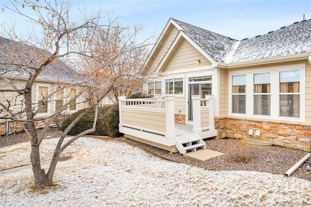 exterior space featuring a wooden deck