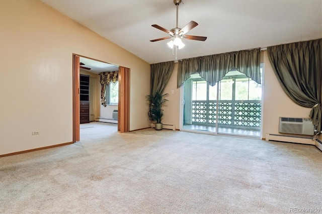 585 S Alton Way Unit 4D, Denver, CO 80247 - carpeted spare room with a baseboard radiator, a ceiling fan, vaulted ceiling, and a wall mounted AC