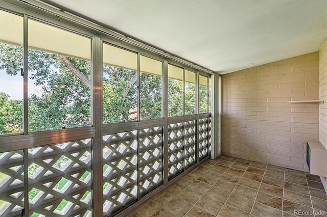 585 S Alton Way Unit 4D, Denver, CO 80247 - unfurnished sunroom with plenty of natural light and lofted ceiling