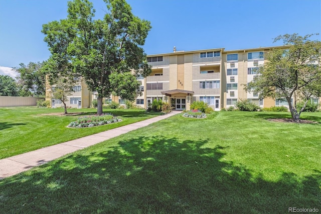 585 S Alton Way Unit 4D, Denver, CO 80247 - view of community with a lawn