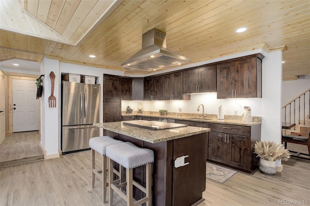 28251 Shadow Mountain Dr, Conifer, CO 80433 - kitchen featuring freestanding refrigerator, island exhaust hood, a sink, wooden ceiling, and dark brown cabinetry