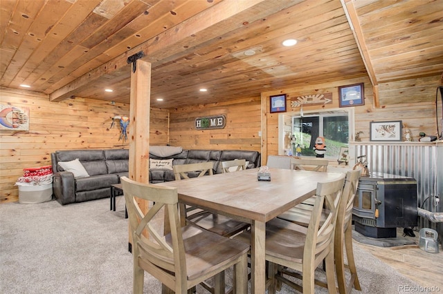 28251 Shadow Mountain Dr, Conifer, CO 80433 - carpeted dining room featuring wood ceiling, a wood stove, wooden walls, and recessed lighting