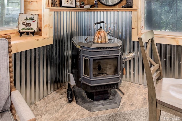 28251 Shadow Mountain Dr, Conifer, CO 80433 - detailed view of a wood stove and wood finished floors