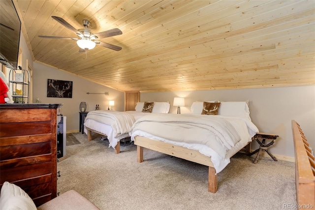 28251 Shadow Mountain Dr, Conifer, CO 80433 - carpeted bedroom featuring wooden ceiling, vaulted ceiling, baseboards, and ceiling fan