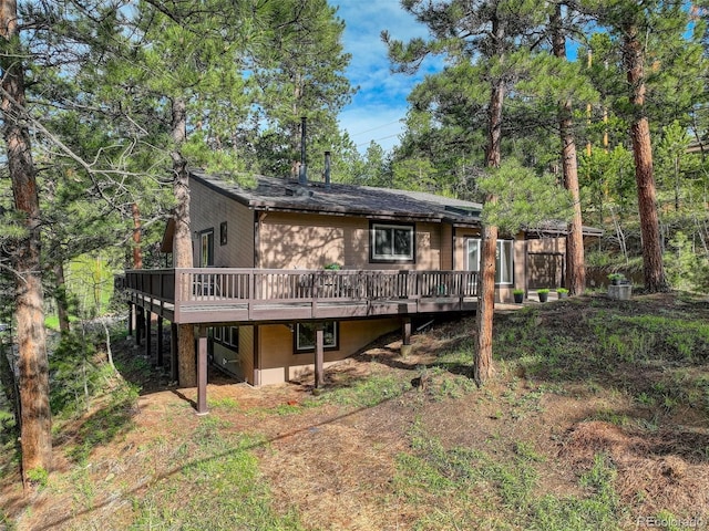 28251 Shadow Mountain Dr, Conifer, CO 80433 - back of house with a wooden deck
