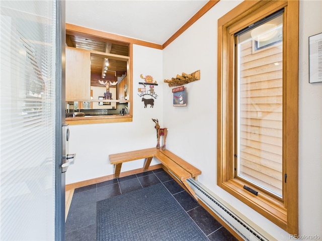 620 Tennis Club Rd Unit 1339, Dillon, CO 80435 - hallway featuring dark tile patterned floors, a baseboard radiator, and ornamental molding