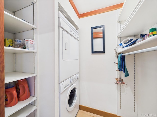 620 Tennis Club Rd Unit 1339, Dillon, CO 80435 - washroom with stacked washing machine and dryer and baseboards