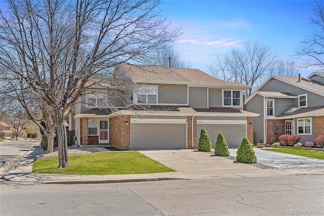 1550 S Syracuse St, Denver, CO 80231 - view of front of property with driveway, a garage, brick siding, and a front yard