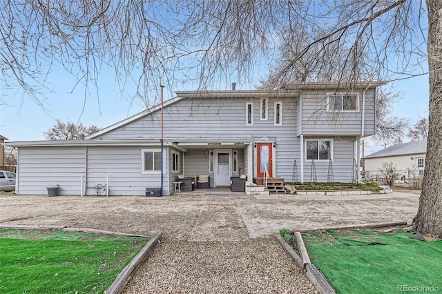 195 Briggs St, Erie, CO 80516 - back of house featuring entry steps and fence