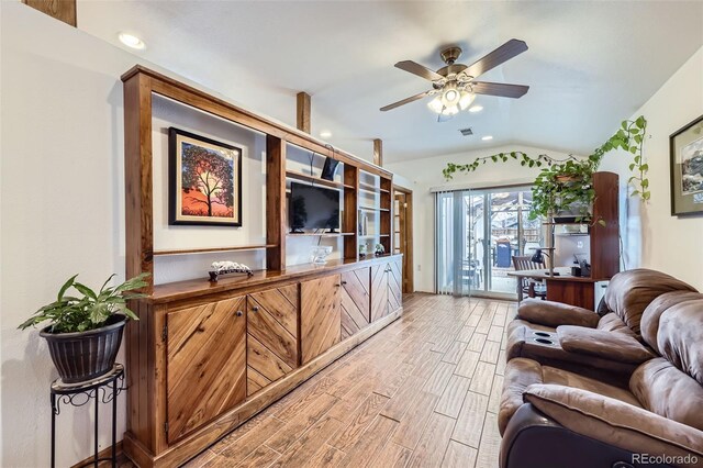 195 Briggs St, Erie, CO 80516 - living area featuring a ceiling fan, visible vents, wood tiled floor, lofted ceiling, and recessed lighting