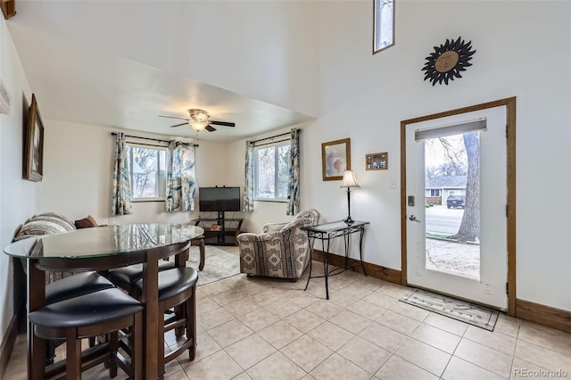 195 Briggs St, Erie, CO 80516 - dining space with light tile patterned floors, baseboards, and ceiling fan