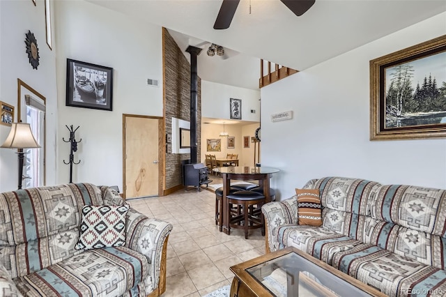 195 Briggs St, Erie, CO 80516 - living area with a high ceiling, light tile patterned flooring, a ceiling fan, and visible vents