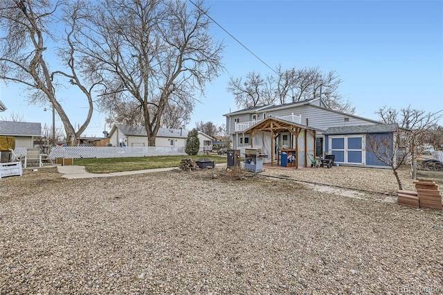 195 Briggs St, Erie, CO 80516 - exterior space with a storage shed, an outdoor structure, and fence