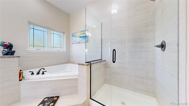 9353 E 146th Ave, Brighton, CO 80602 - bathroom with a stall shower and a garden tub