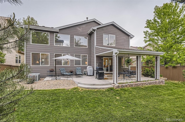 10230 Lauren Ct, Highlands Ranch, CO 80130 - rear view of house with a patio area