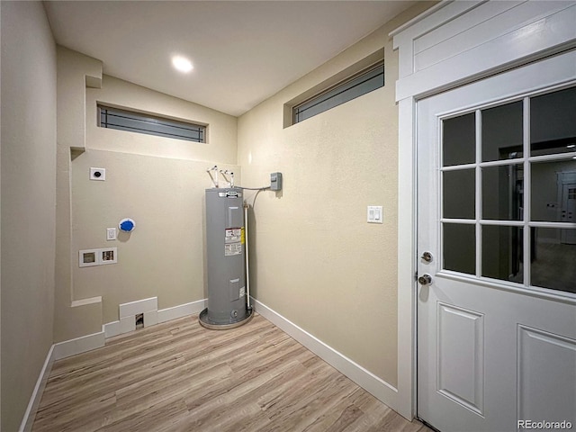 utility room featuring electric water heater