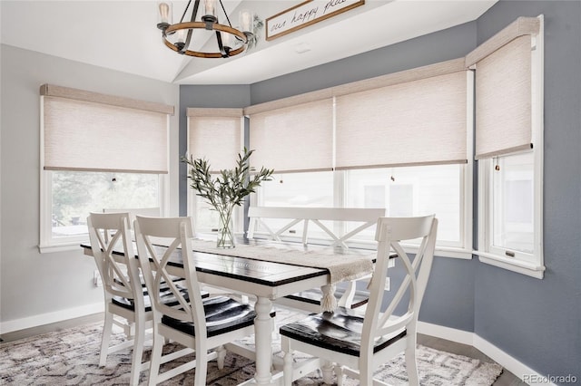 6386 S Pierson St, Littleton, CO 80127 - dining area featuring a chandelier and baseboards