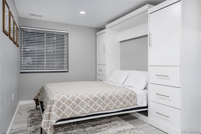 6386 S Pierson St, Littleton, CO 80127 - bedroom with light wood-style floors, recessed lighting, and baseboards