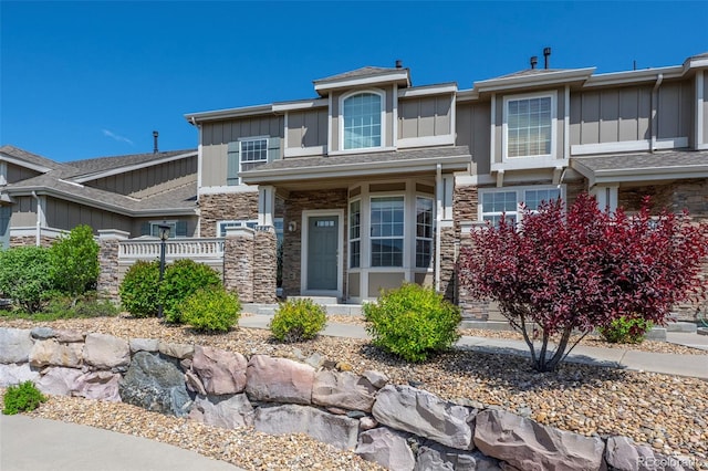 4887 Raven Run, Broomfield, CO 80023 - view of front of house with board and batten siding and stone siding