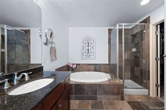 4887 Raven Run, Broomfield, CO 80023 - full bathroom with vanity, a bath, and a stall shower