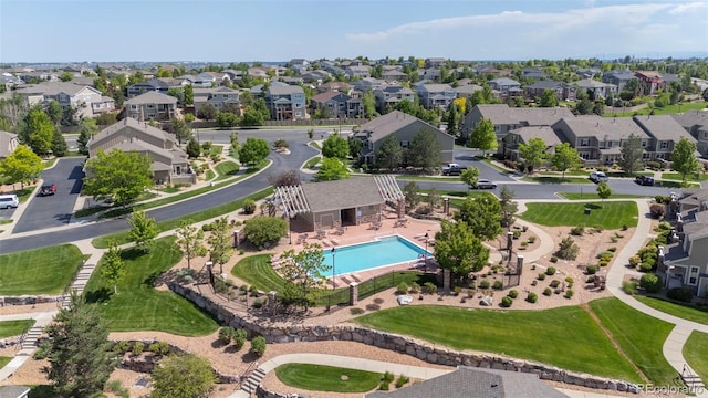 4887 Raven Run, Broomfield, CO 80023 - aerial perspective of suburban area with a pool